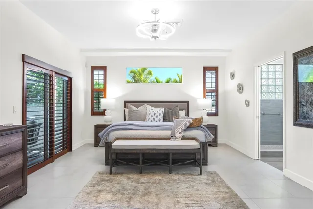 a bathroom with a shower and a window