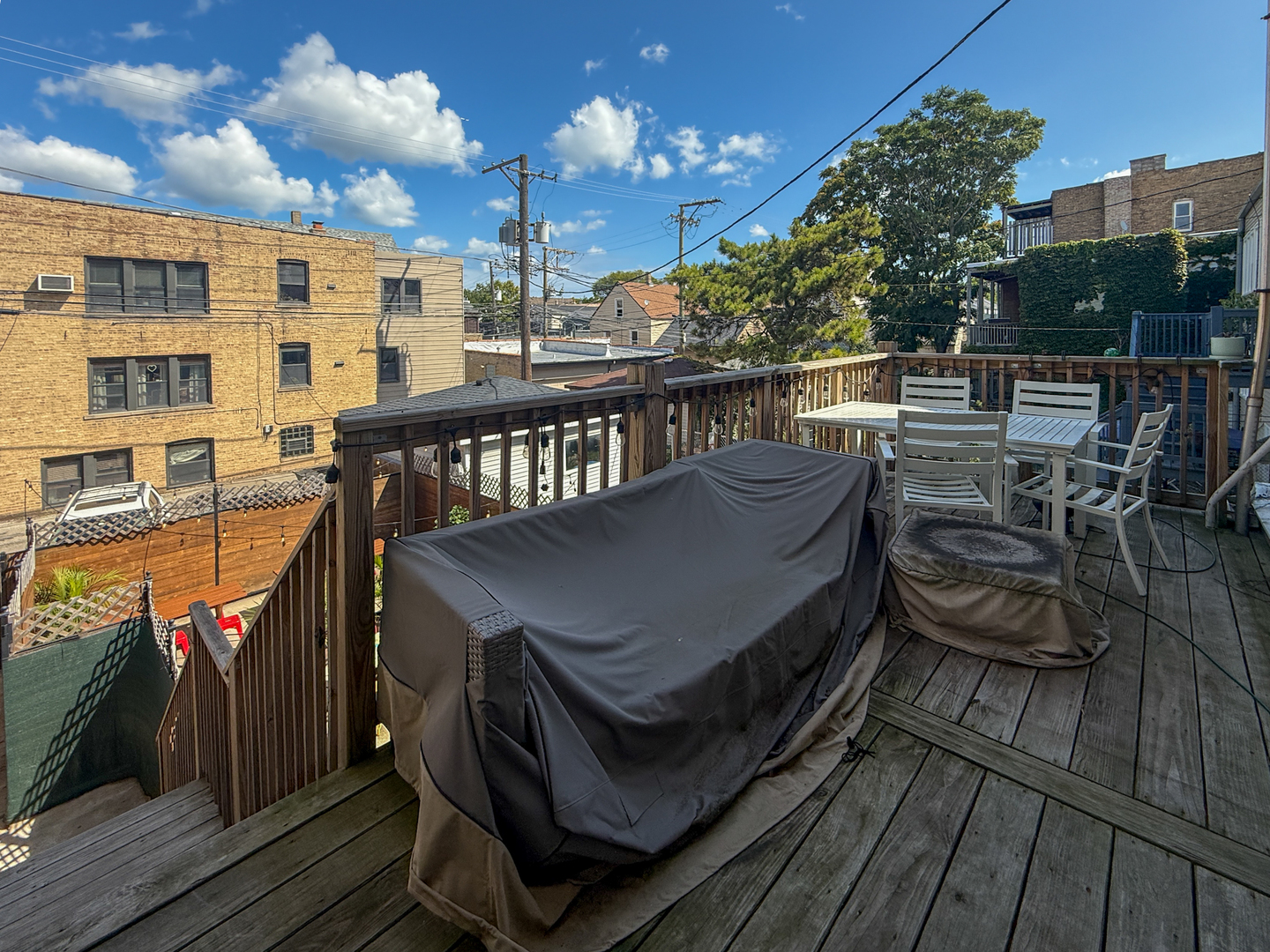 2022 West Roscoe Street, Unit 2 Chicago, IL 60618 - Photo 2 of 2 a view of a balcony with chairs