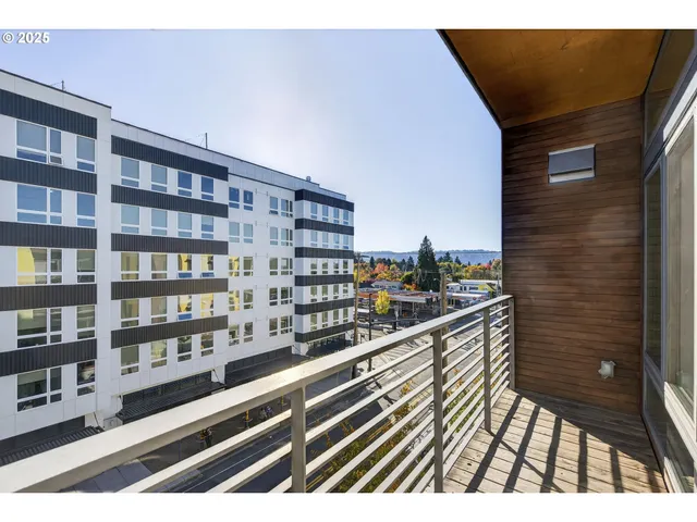a view of balcony with a potted plant