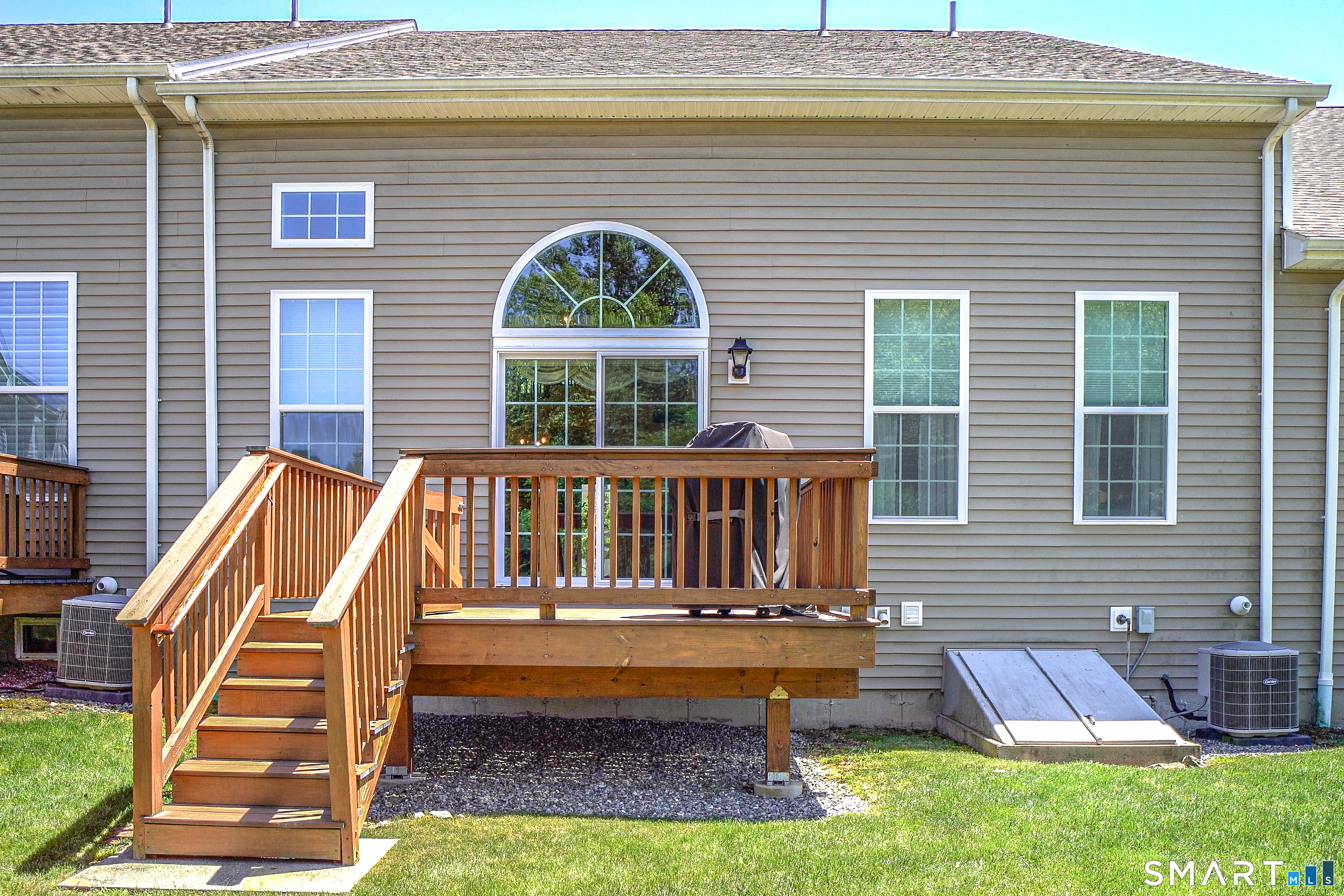 6 Lilac Lane, Unit 6 Prospect, CT 06712 - Photo 31 of 40 The Belco door to the basement allows for easy storage. Deck with extras- stairs to the rear level yard and a natural gas line for easy grill hookup! Never run out of gas!