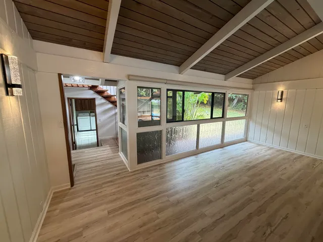 a utility room with cabinets