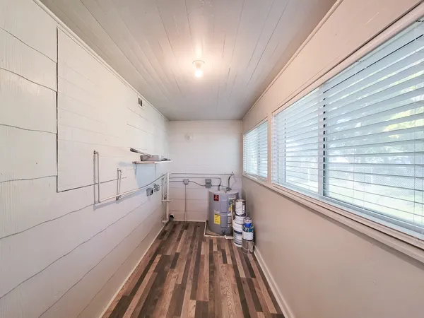 a view of a room with racks on the wall