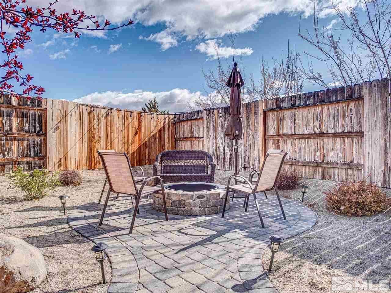 10040 Stonefield Drive Reno, NV 89521 - Photo 20 of 24 a view of a chairs and tables in the patio