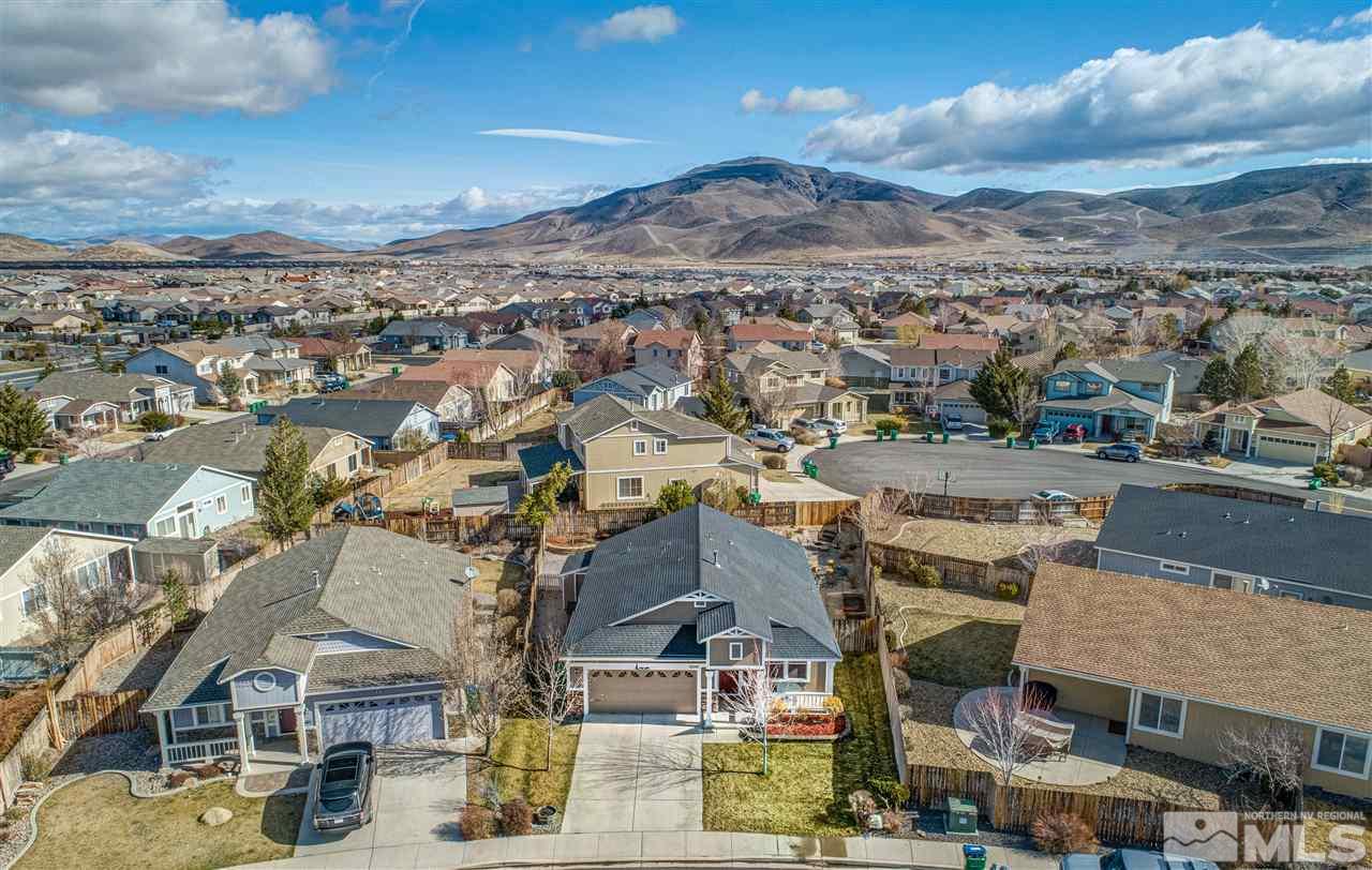 10040 Stonefield Drive Reno, NV 89521 - Photo 3 of 24 an aerial view of residential houses with outdoor space
