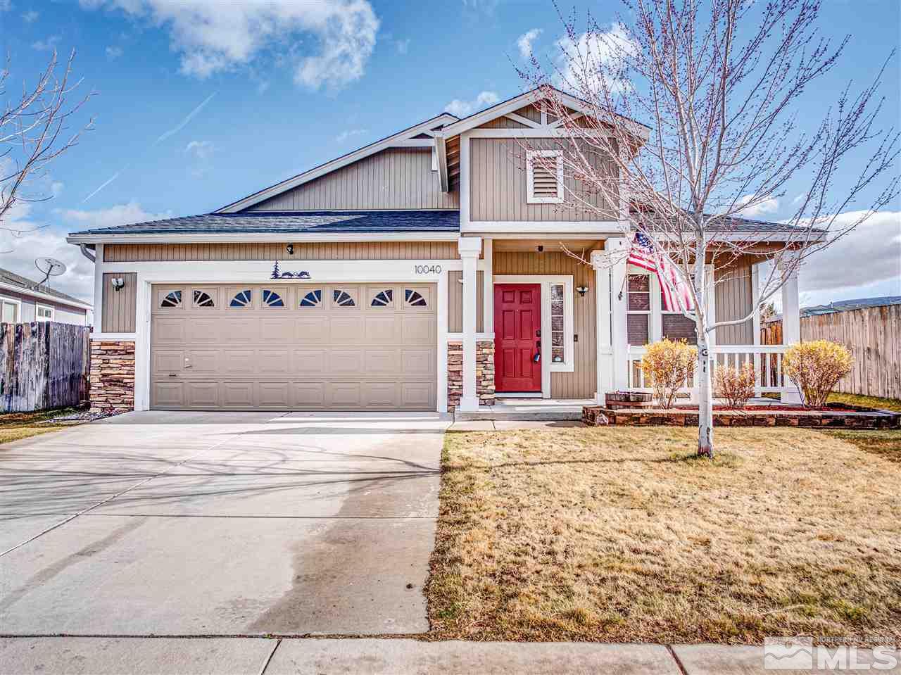 10040 Stonefield Drive Reno, NV 89521 - Photo 5 of 24 a front view of a building with retail shops