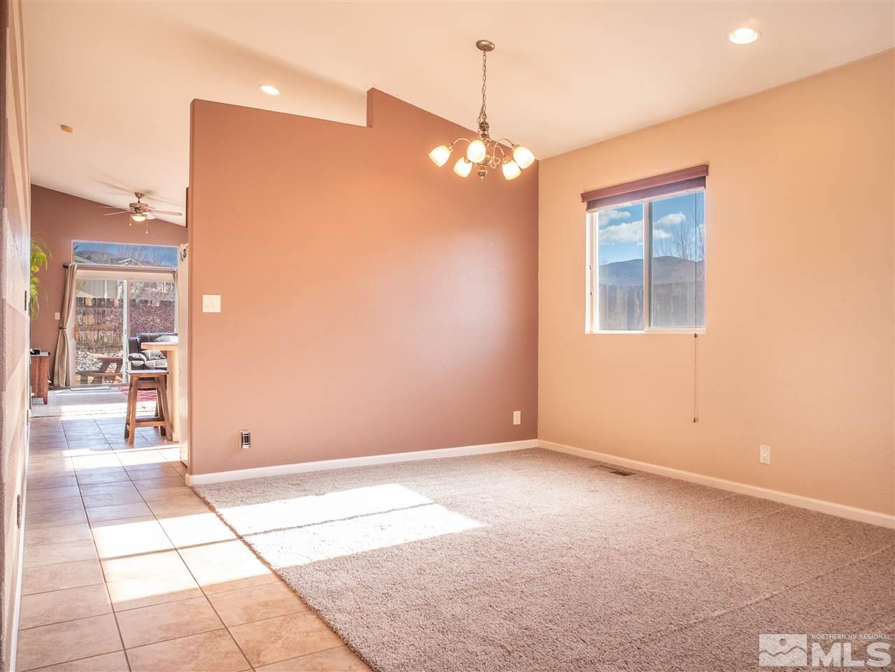 10040 Stonefield Drive Reno, NV 89521 - Photo 7 of 24 a view of livingroom with window