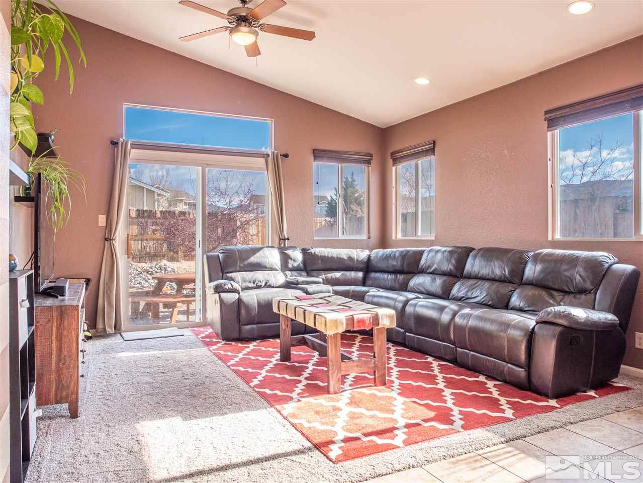 10040 Stonefield Drive Reno, NV 89521 - Photo 10 of 24 a living room with furniture and a window