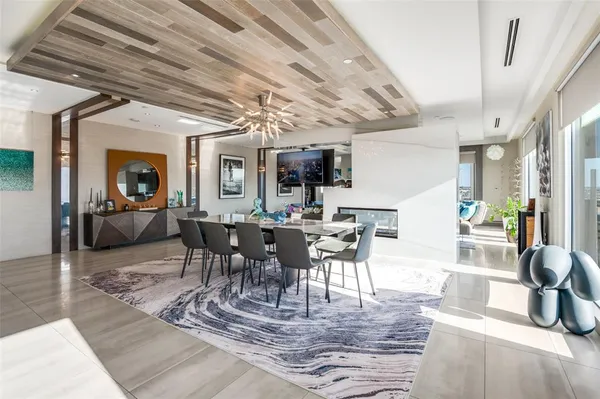 a large kitchen with stainless steel appliances granite countertop a lot of counter space and a stove