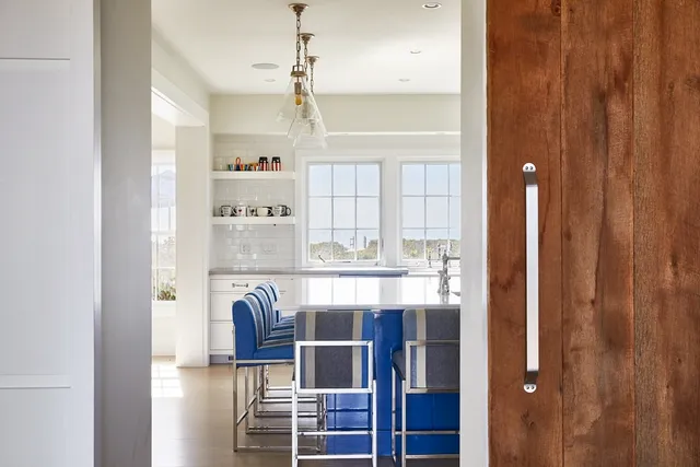 a kitchen with a refrigerator and countertop