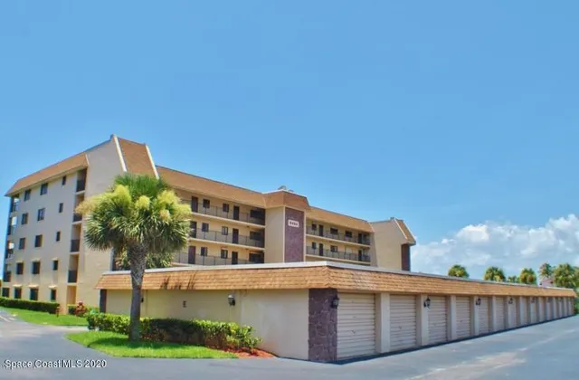 a front view of building with yard