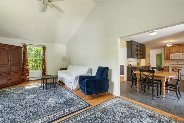 a living room with furniture and a table