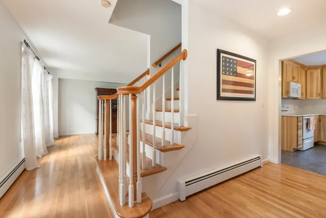 a view of entryway with wooden floor