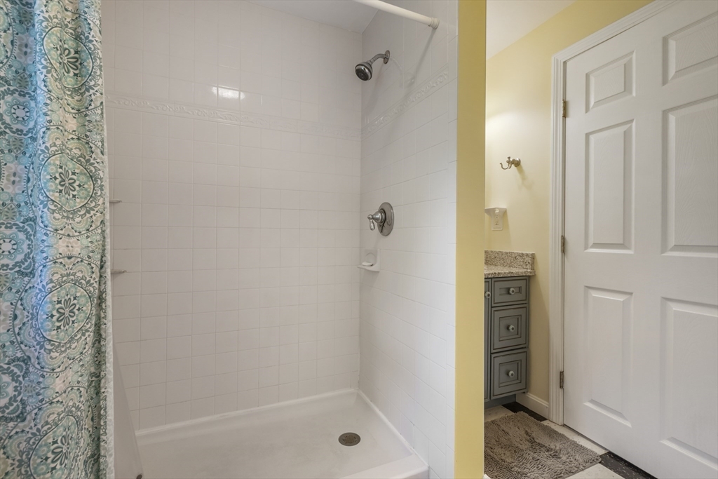 11 Old Farm Road Douglas, MA 01516 - Photo 29 of 42 a bathroom with a bathtub