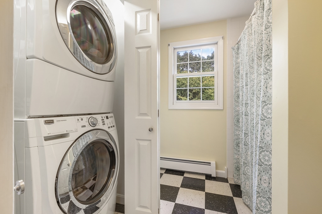 11 Old Farm Road Douglas, MA 01516 - Photo 30 of 42 a view of a bedroom with washer and dryer