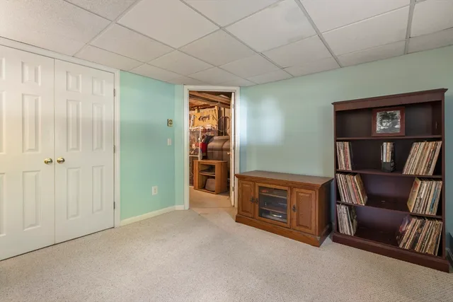 a room with furniture and a fireplace