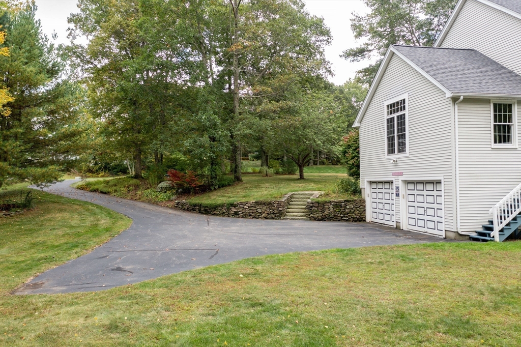11 Old Farm Road Douglas, MA 01516 - Photo 37 of 42 a view of a house with a yard and pathway