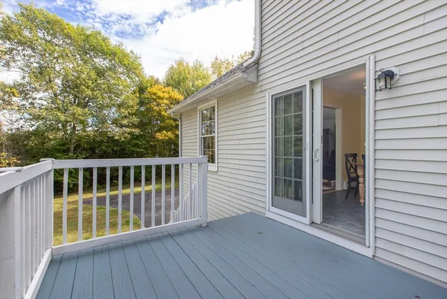a view of balcony with wooden floor