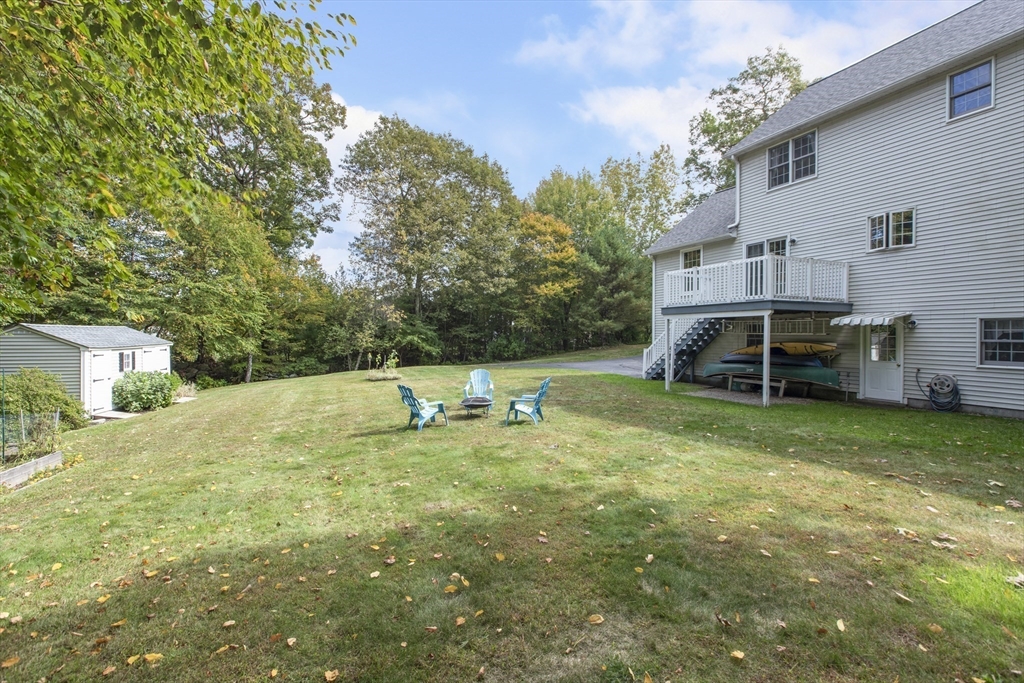11 Old Farm Road Douglas, MA 01516 - Photo 7 of 42 a view of a house with a backyard