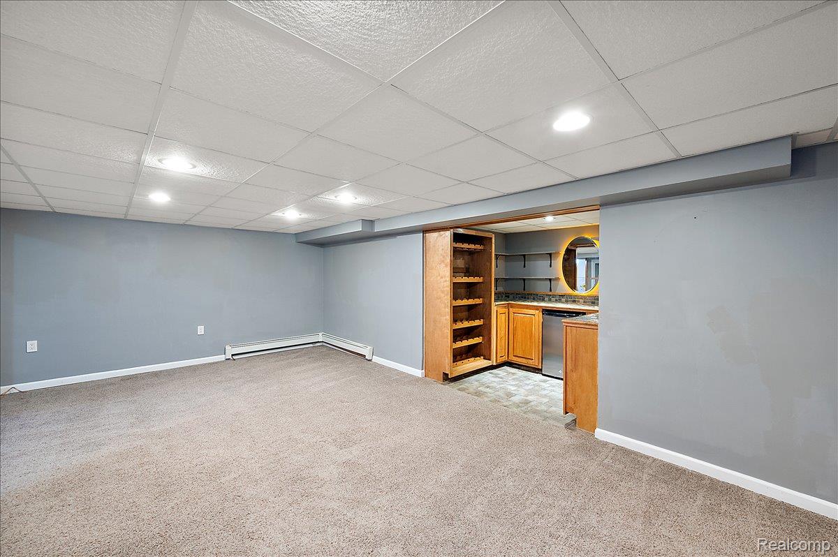 4403 Amherst Road Royal Oak, MI 48073 - Photo 41 of 60 View from Family Room/Rec Room into Lower Level Bar