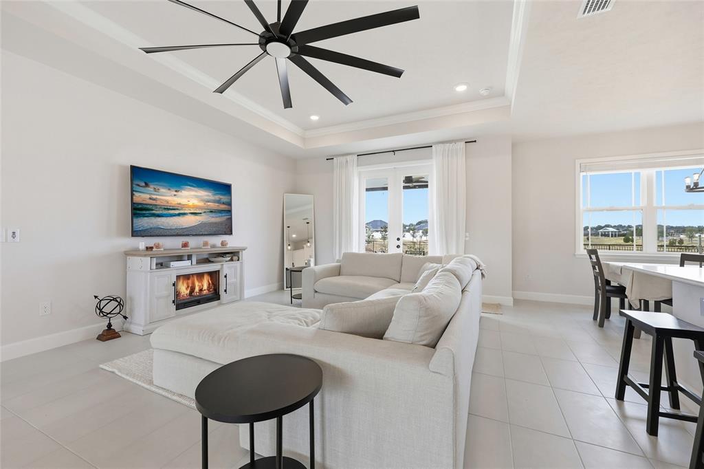 1922 Southwest 244th Way Newberry, FL 32669 - Photo 12 of 31 a living room with furniture and a flat screen tv