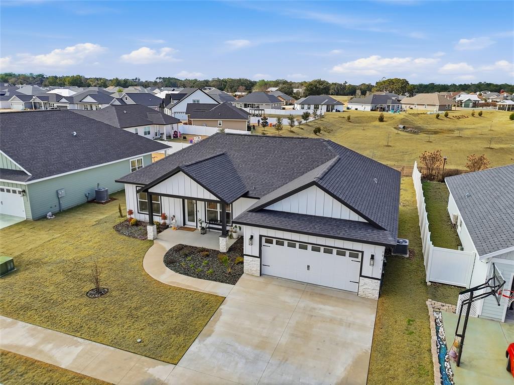 1922 Southwest 244th Way Newberry, FL 32669 - Photo 27 of 31 an aerial view of residential houses with outdoor space and ocean view