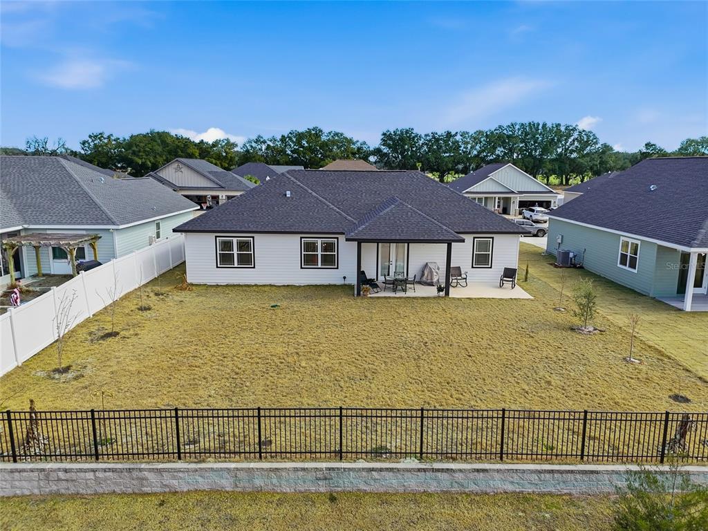 1922 Southwest 244th Way Newberry, FL 32669 - Photo 28 of 31 a view of house with swimming pool
