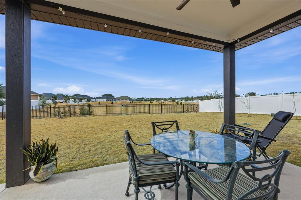 1922 Southwest 244th Way Newberry, FL 32669 - Photo 4 of 31 a view of a lake with furniture and window