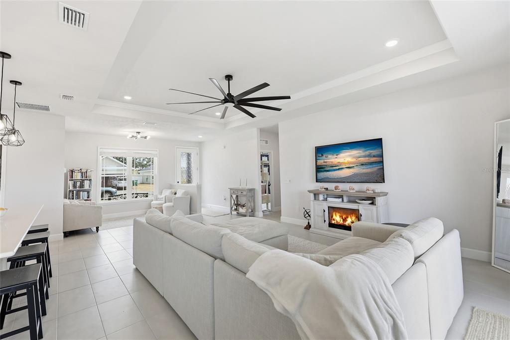 1922 Southwest 244th Way Newberry, FL 32669 - Photo 8 of 31 a living room with furniture and a flat screen tv