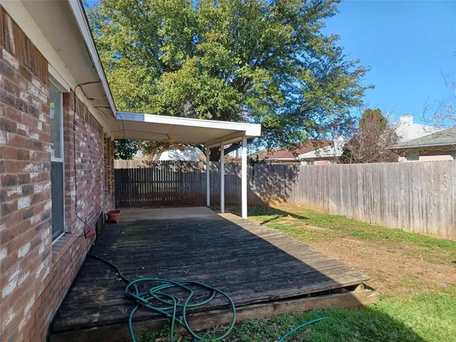 a view of a backyard with a garden