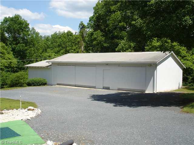 763 Bescher Chapel Road Trinity, NC 27370 - Photo 15 of 16 Workshop. 3 bay garage and workshop