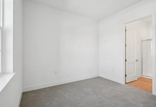 a room with furniture and wooden floor