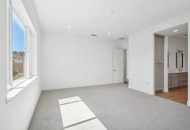 a view of an empty walk in closet