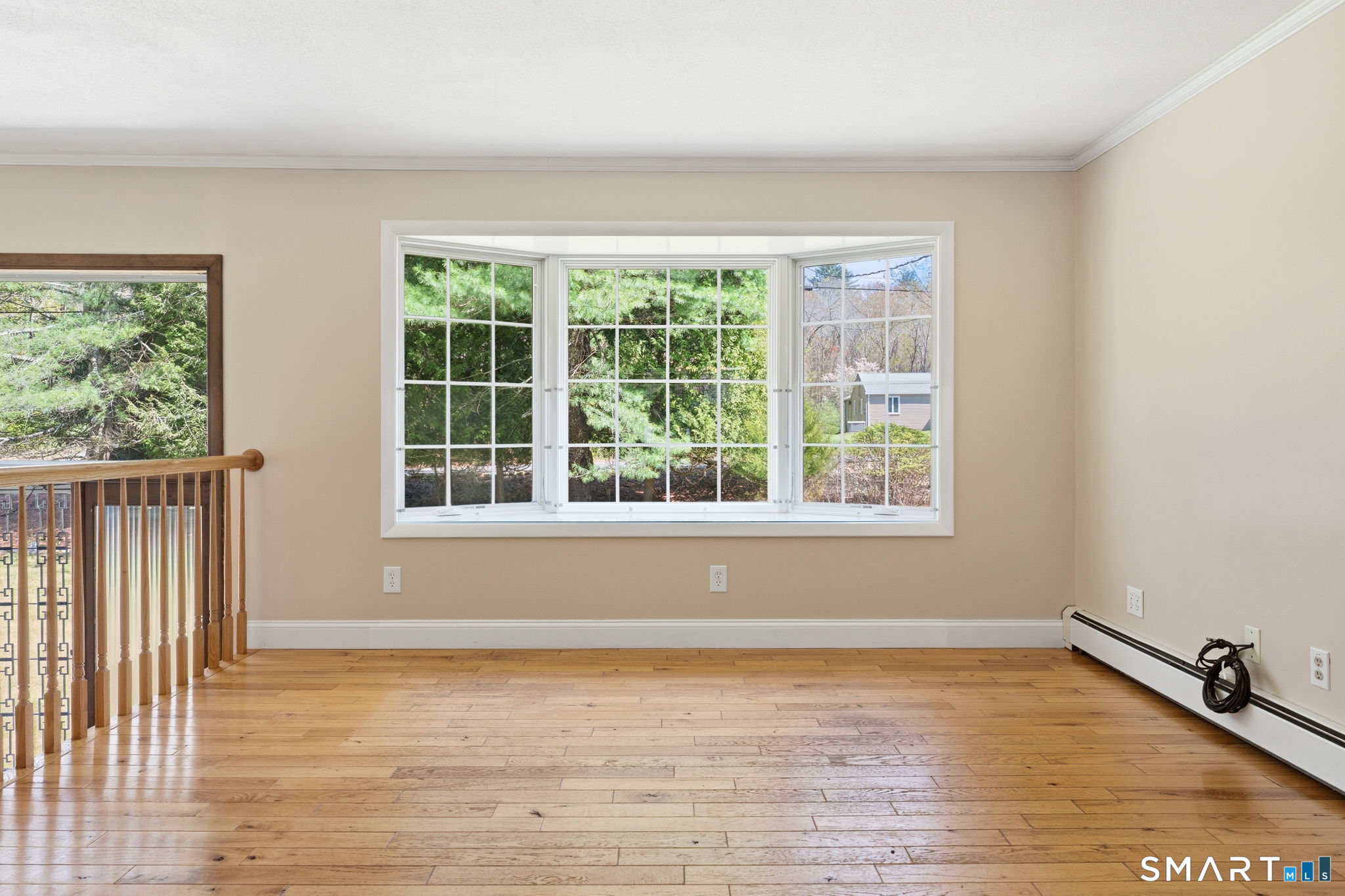 97 Brookside Lane Mansfield, CT 06250 - Photo 13 of 40 Stunning bay window allows sunshine galore!