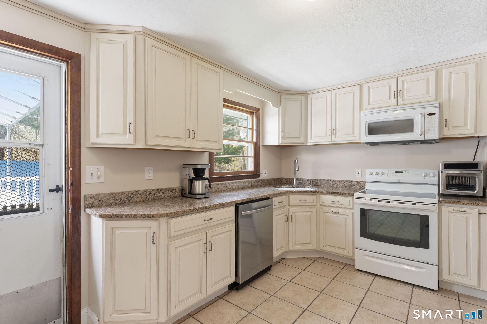 97 Brookside Lane Mansfield, CT 06250 - Photo 5 of 40 Updated kitchen with tile flooring and granite counters.
