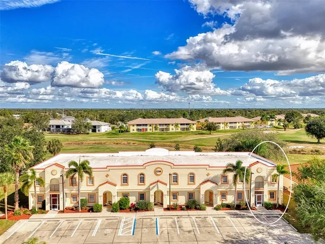 a view of a building with a ocean view