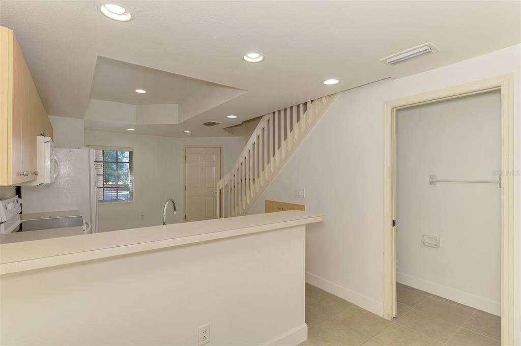 1246 Rio De Janeiro Avenue, Unit 510 Punta Gorda, FL 33983 - Photo 11 of 52 a view of a hallway with staircase