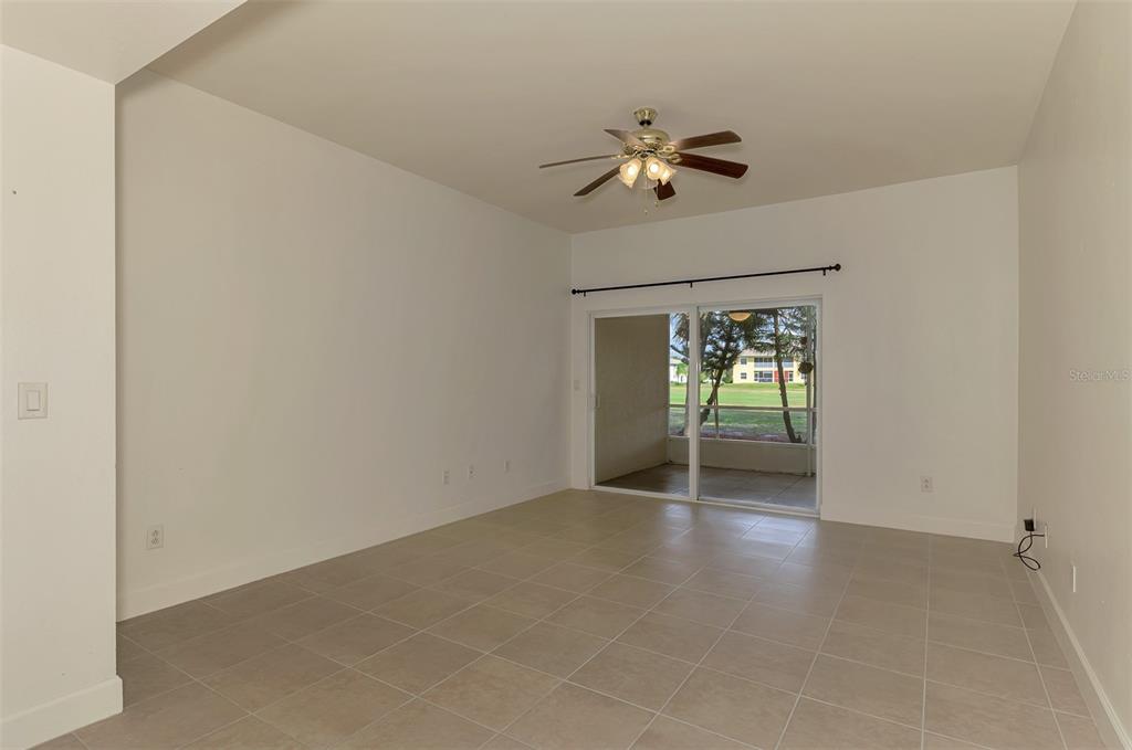 1246 Rio De Janeiro Avenue, Unit 510 Punta Gorda, FL 33983 - Photo 13 of 52 a view of an empty room with a window