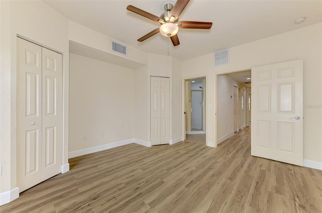 1246 Rio De Janeiro Avenue, Unit 510 Punta Gorda, FL 33983 - Photo 23 of 52 a view of empty room with wooden floor