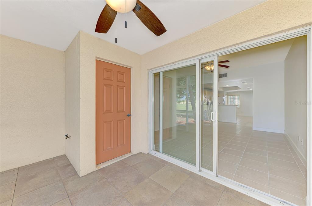 1246 Rio De Janeiro Avenue, Unit 510 Punta Gorda, FL 33983 - Photo 35 of 52 en empty room with sliding door and windows