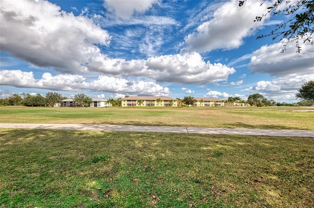 1246 Rio De Janeiro Avenue, Unit 510 Punta Gorda, FL 33983 - Photo 38 of 52 a view of a city with an ocean beach