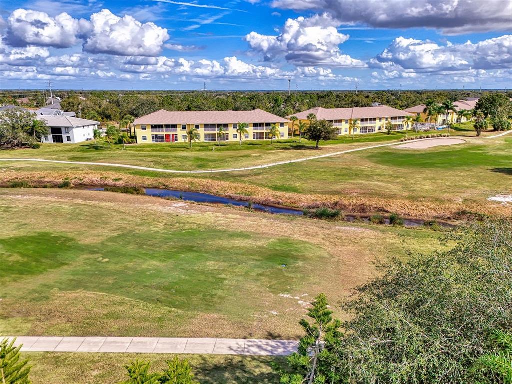 1246 Rio De Janeiro Avenue, Unit 510 Punta Gorda, FL 33983 - Photo 41 of 52 a view of an ocean and a building