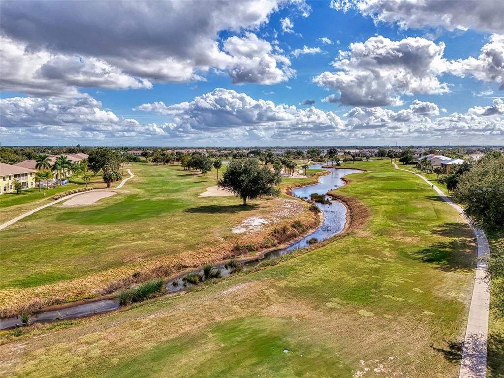 1246 Rio De Janeiro Avenue, Unit 510 Punta Gorda, FL 33983 - Photo 43 of 52 a view of an ocean and beach