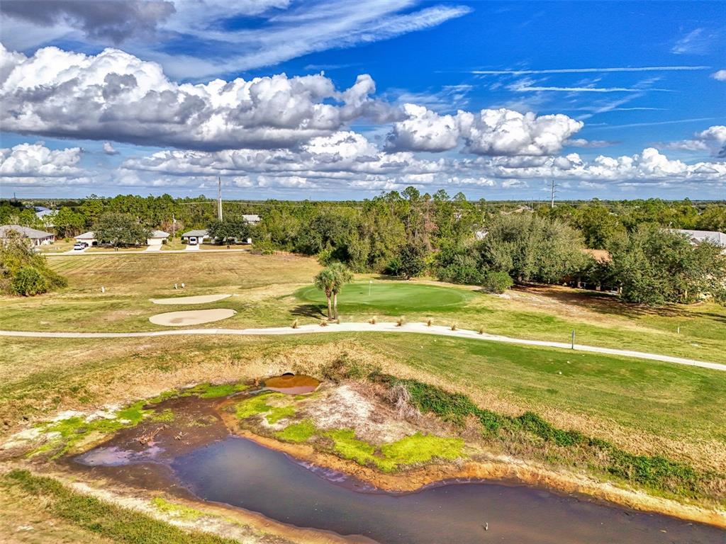 1246 Rio De Janeiro Avenue, Unit 510 Punta Gorda, FL 33983 - Photo 46 of 52 a view of an ocean and beach