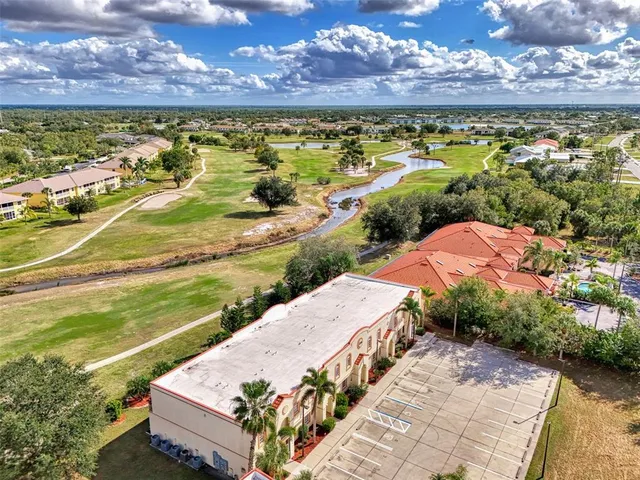a front view of residential houses with street
