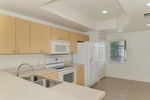 a view of a hallway with staircase