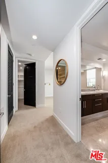 a view of a room with a washer and dryer