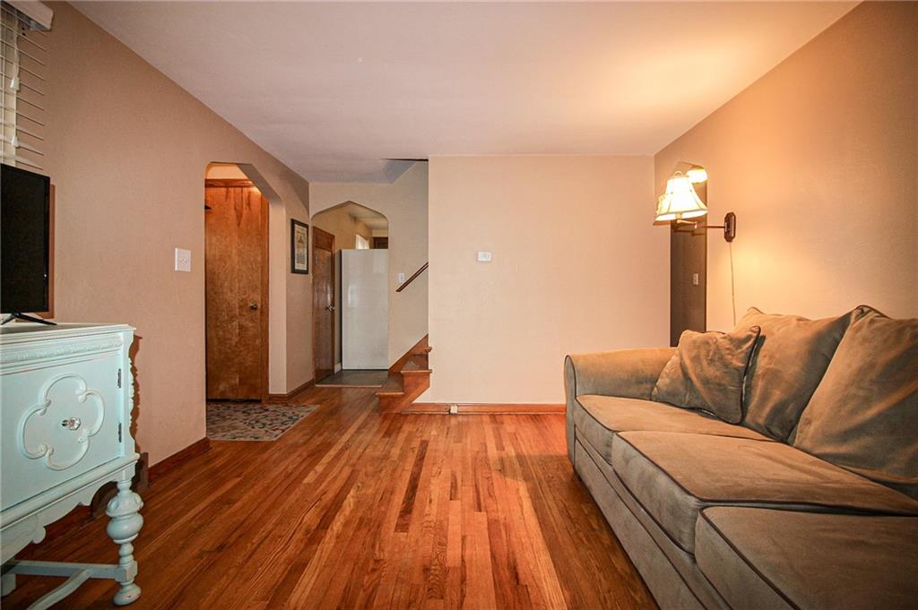 164 Gill Hall Road Clairton, PA 15025 - Photo 6 of 30 a living room with furniture and a flat screen tv