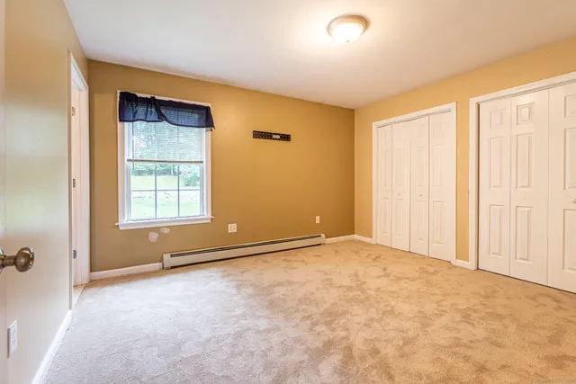 an empty room with a natural light