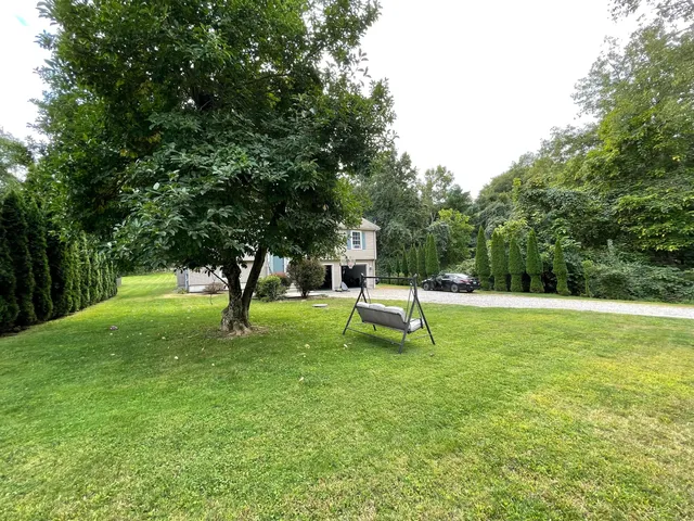 a park view with a bench in a park
