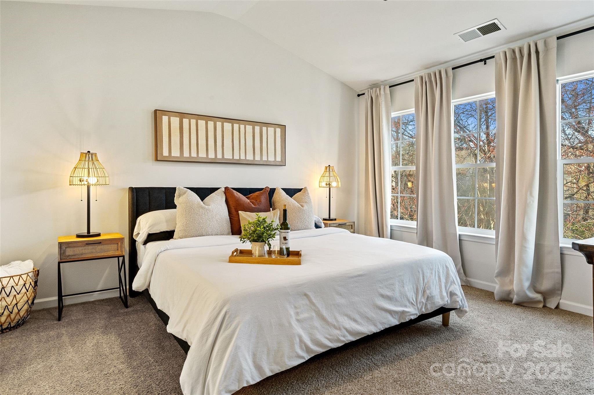 11708 Huxley Road Charlotte, NC 28277 - Photo 23 of 40 a bedroom with bed and a window